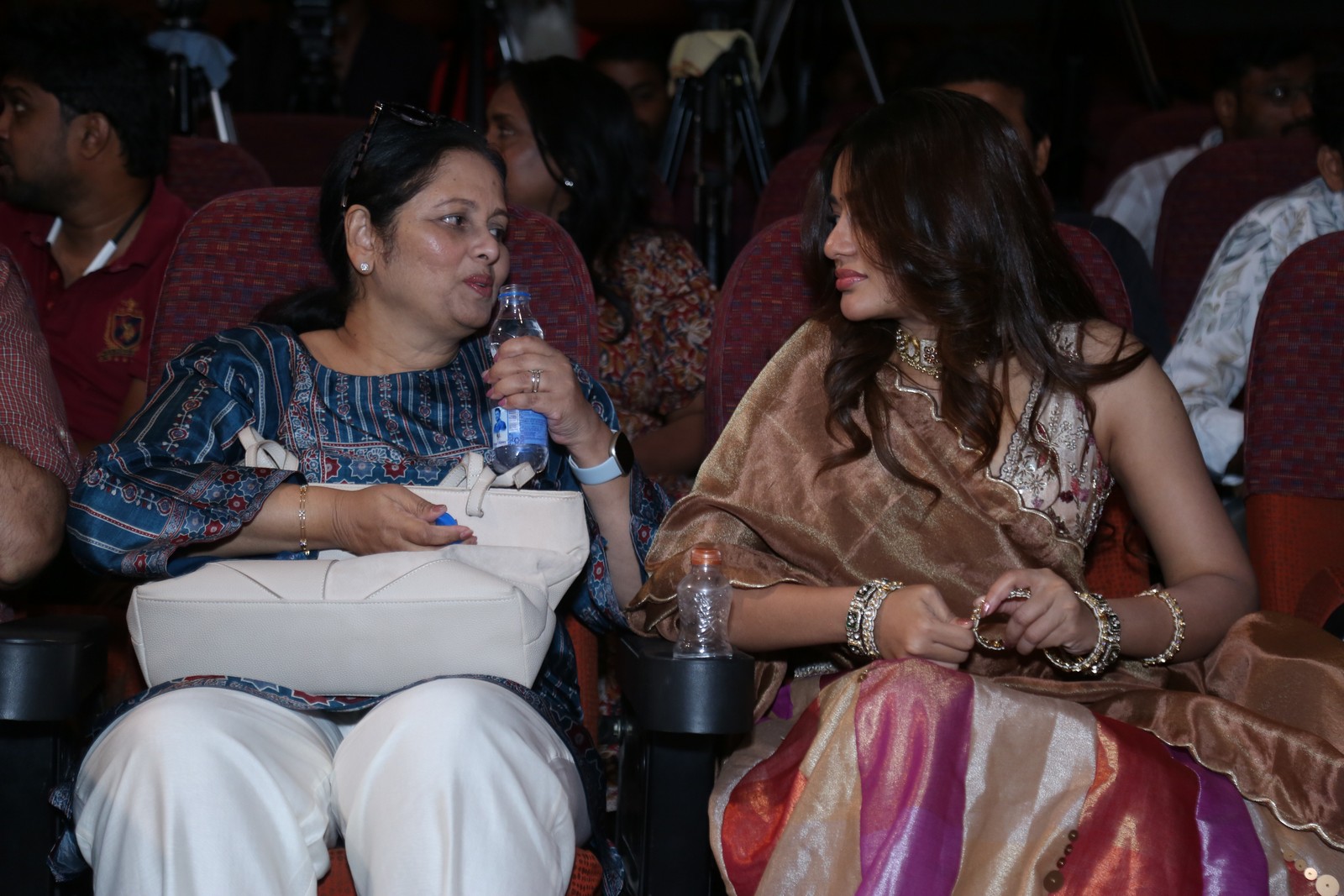 Jayasudha and Deepshikha Chandran seated at event