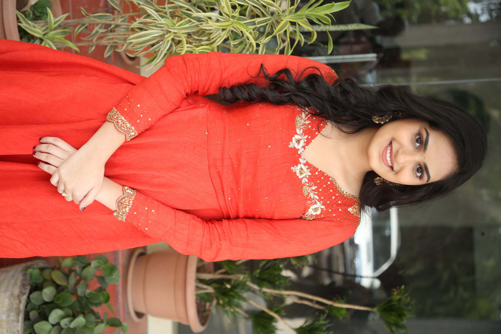 Rayancha Kokkura radiating regal charm in red attire
