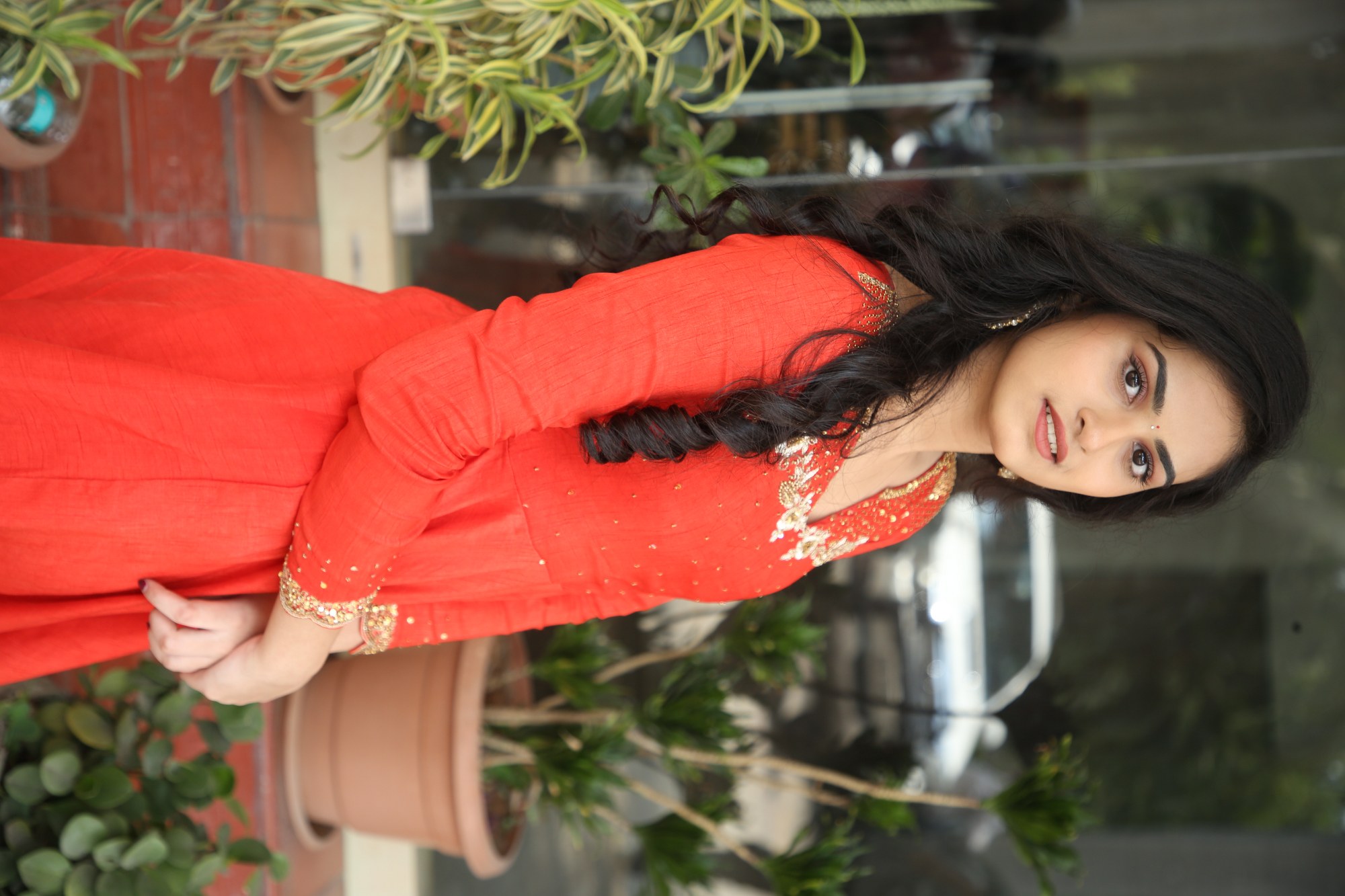 Rayancha Kokkura showcasing graceful style in red outfit
