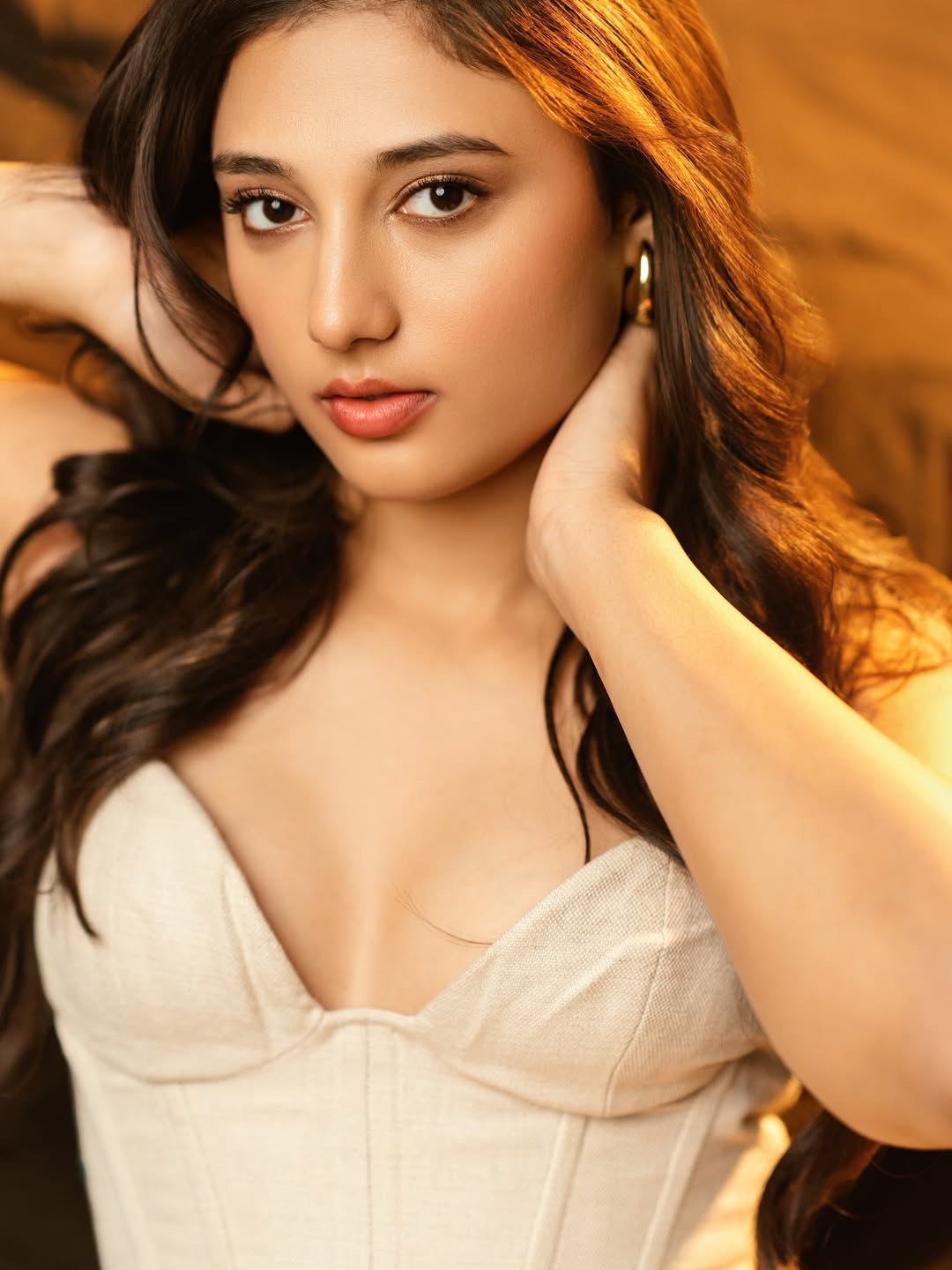 Ritika Nayak in a timeless corset dress featuring structured detailing and sophisticated glamour.