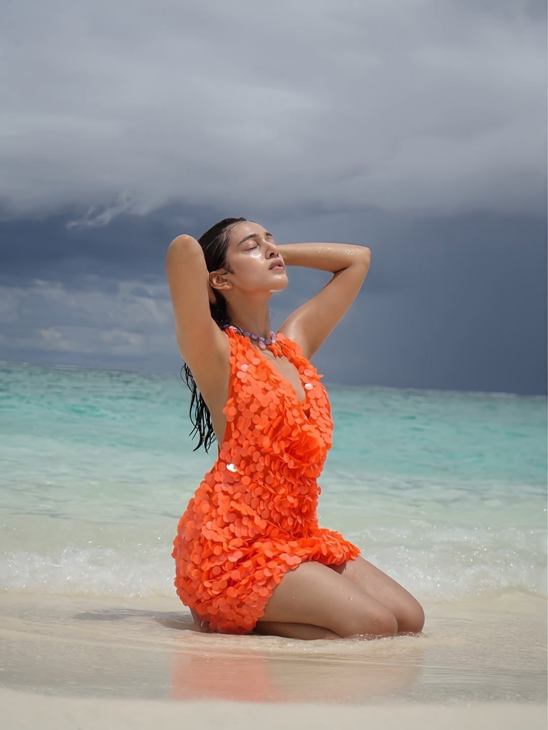 Orange Sequin Look Brings Tropical Drama