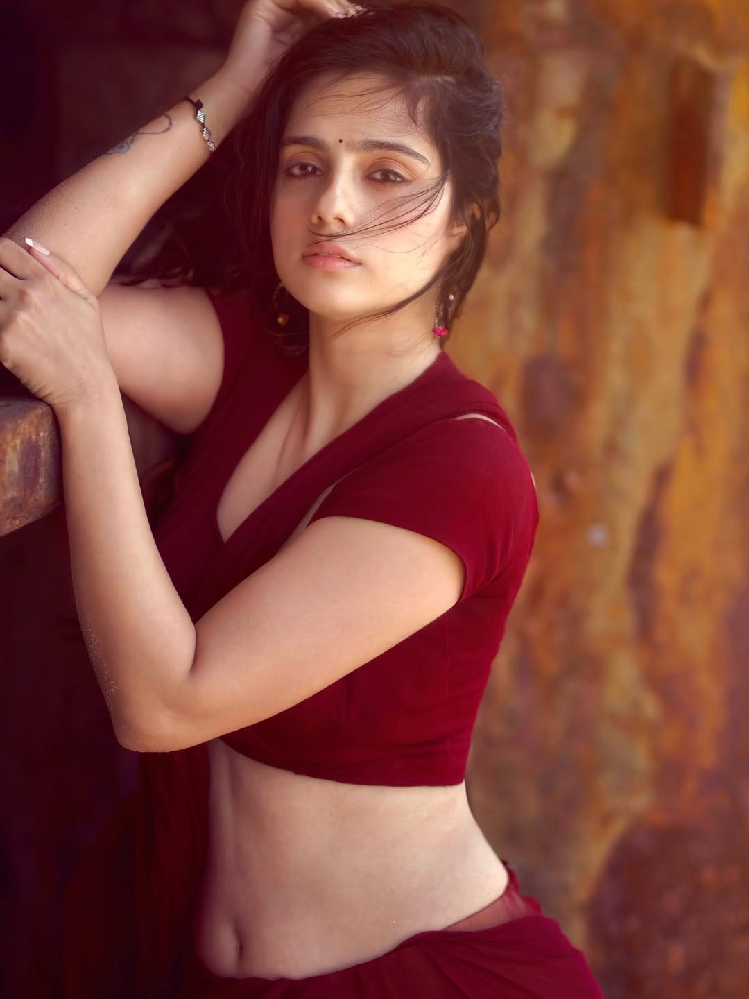 Rose Sardana in elegant maroon draped outfit