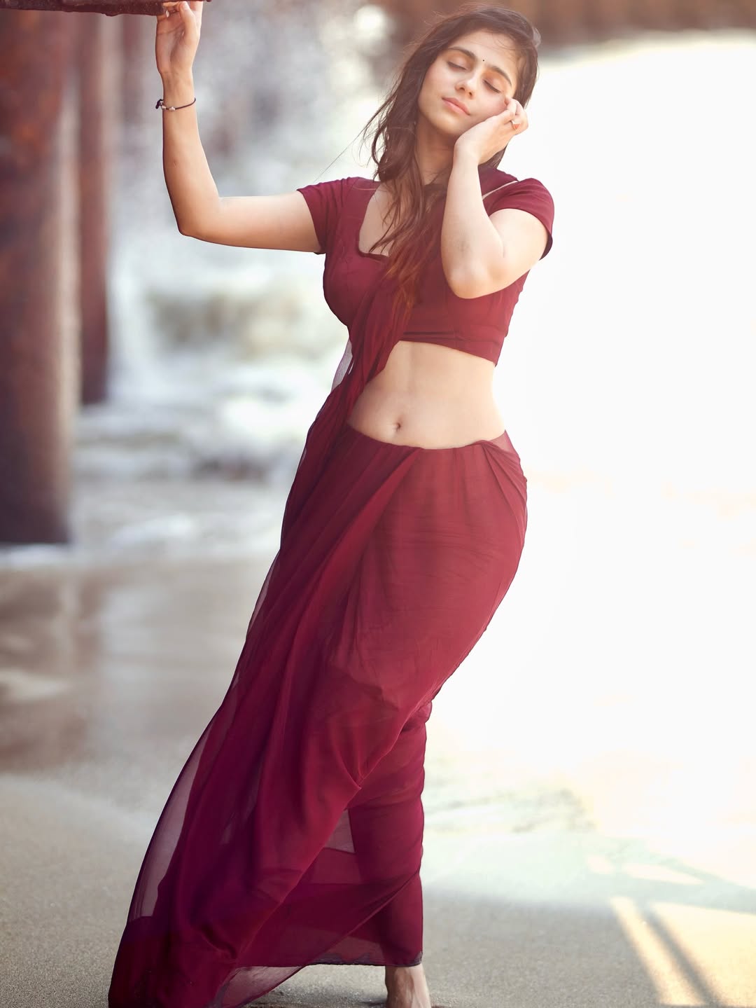 Rose Sardana beach photoshoot in maroon drape