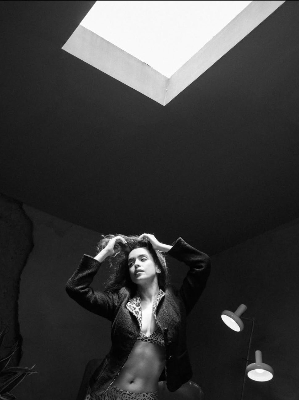 Sanya Malhotra black-and-white fashion portrait with dramatic lighting
