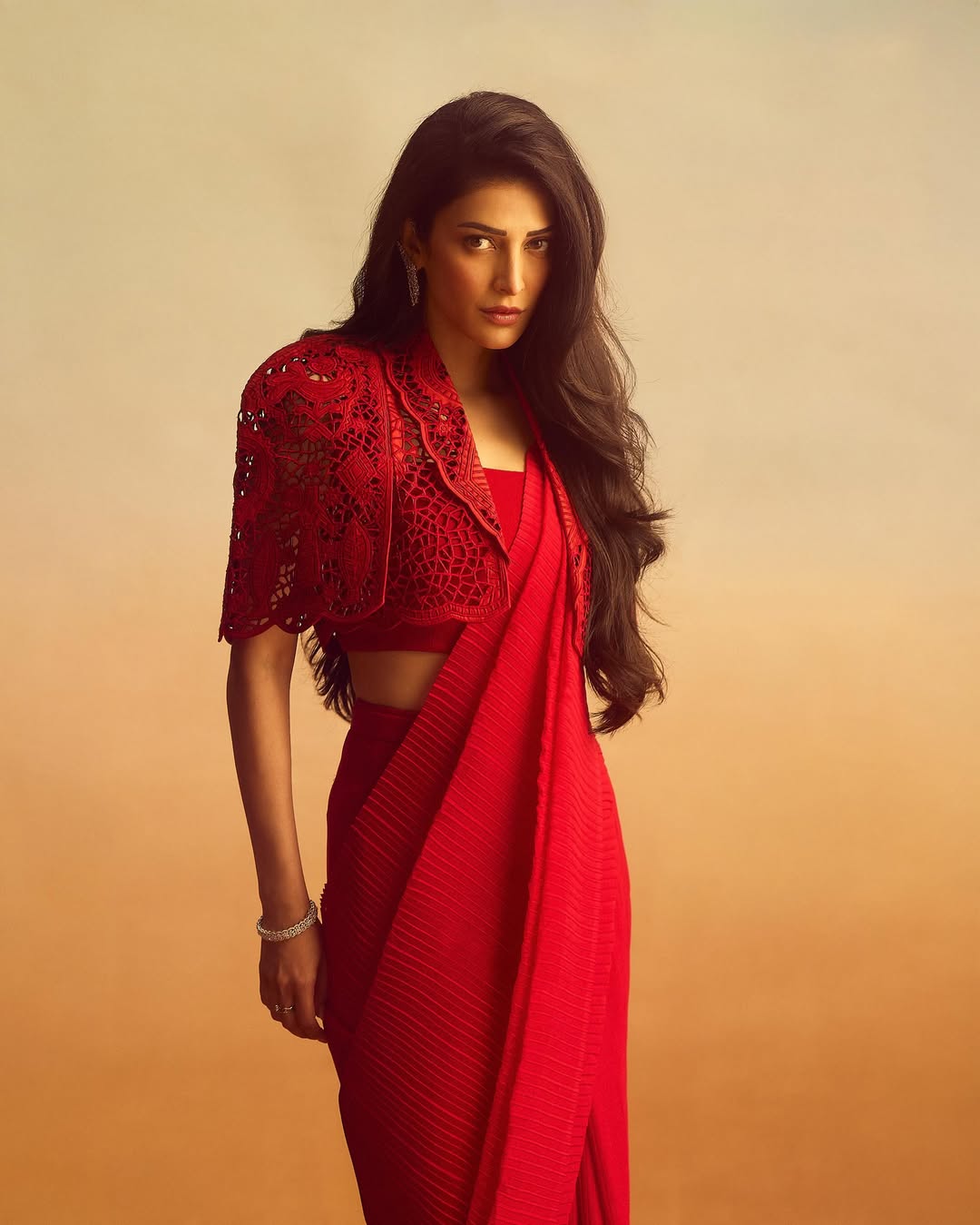 A Dramatic Entrance in Crimson Couture
