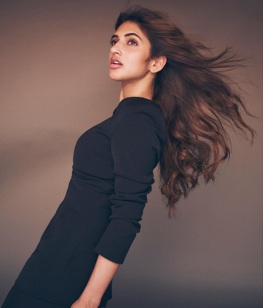 Sreeleela glamorous pose with windblown hair