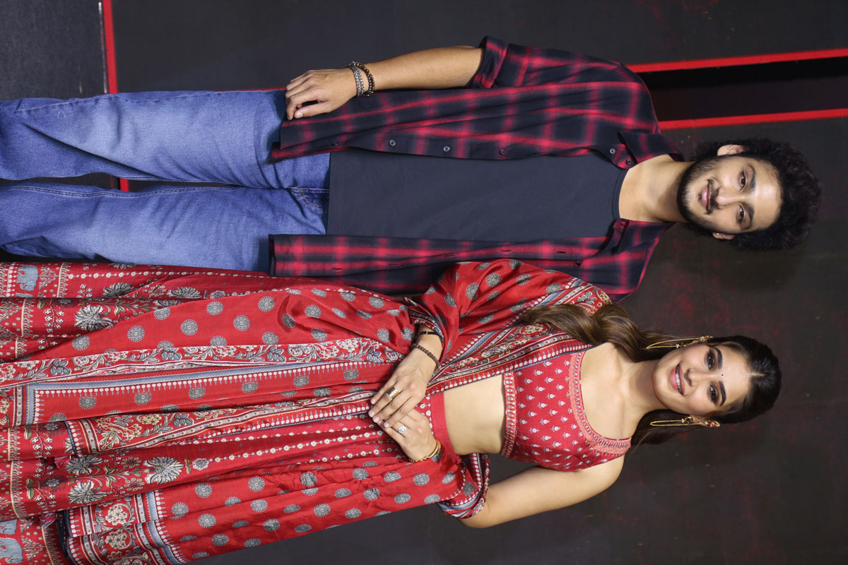 Jaya Krishna Ghattamaneni and Rasha Thadani posing