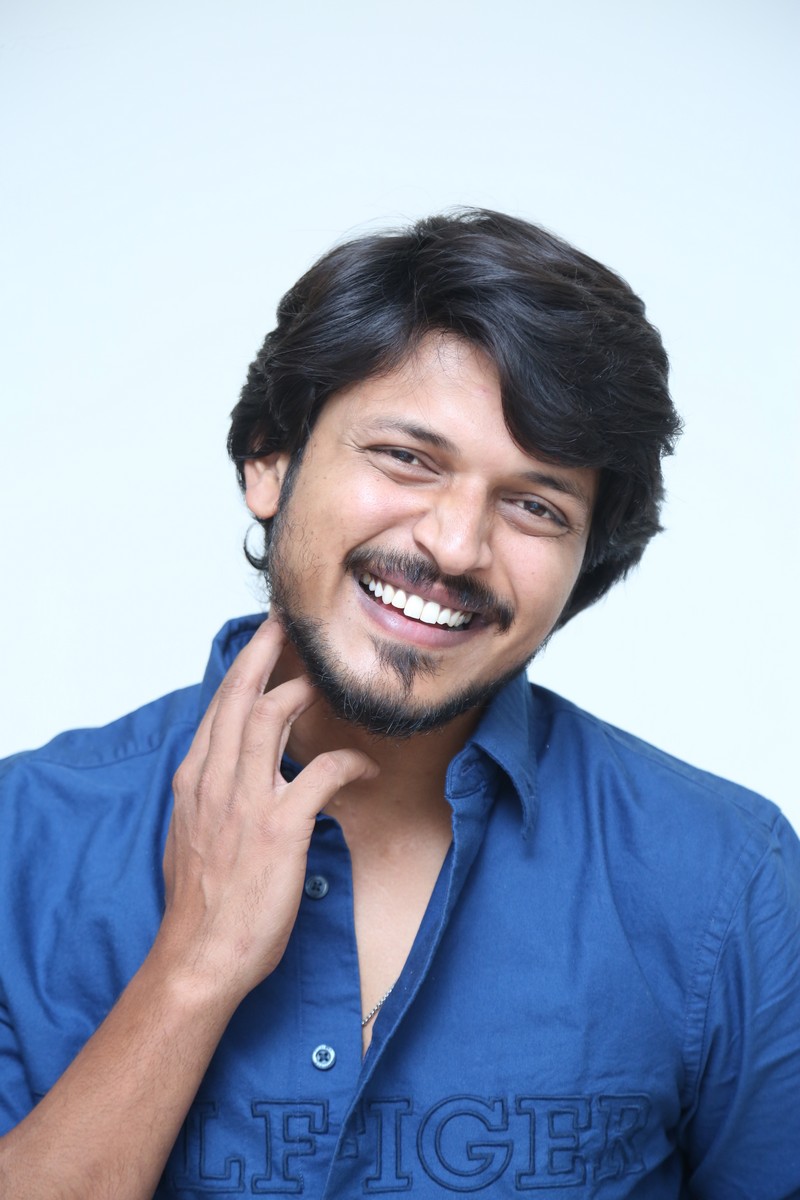 Sumanth Prabhas wearing blue button-down shirt with confident pose
