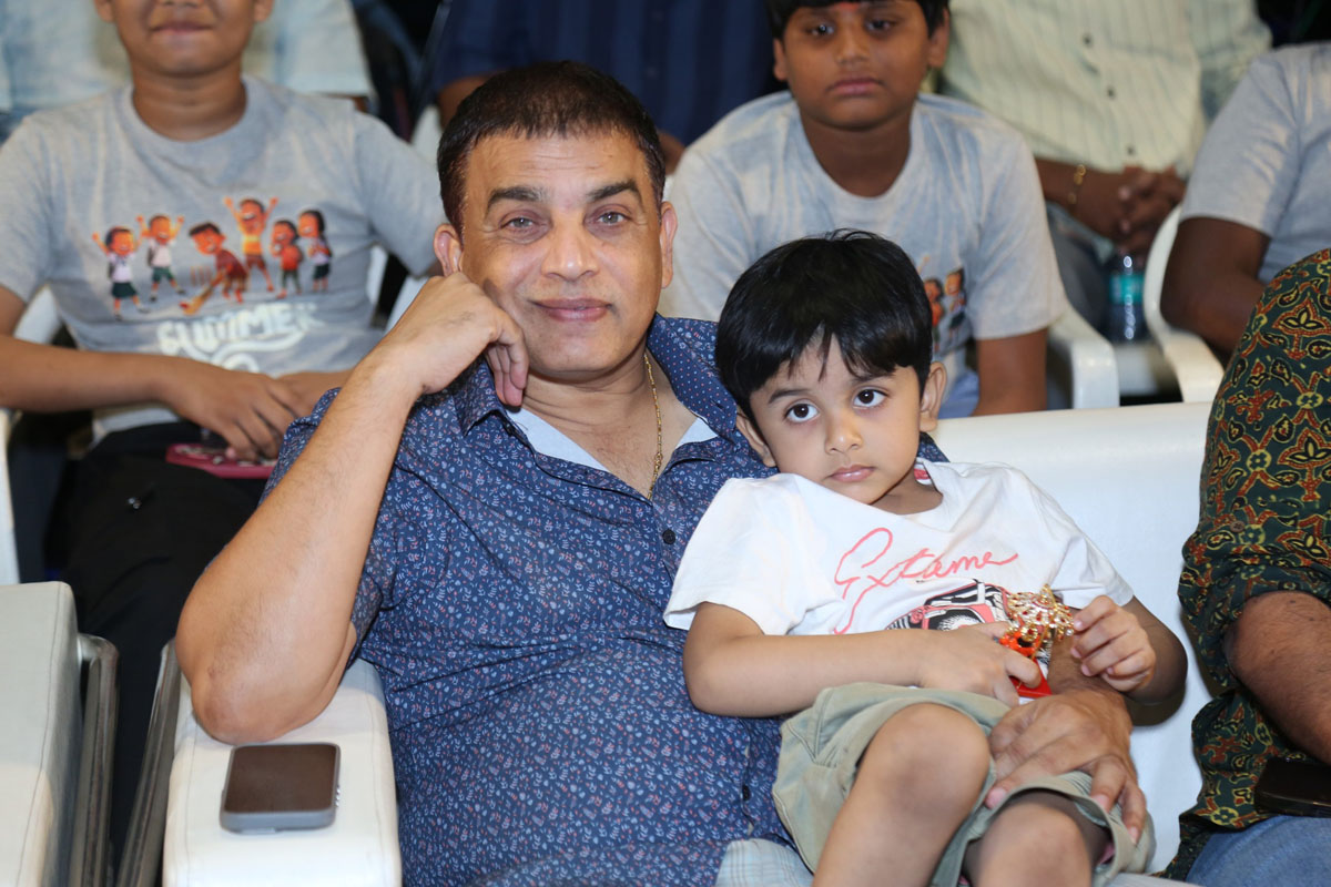 Dil Raju smiling while seated at Summer Holidays event.