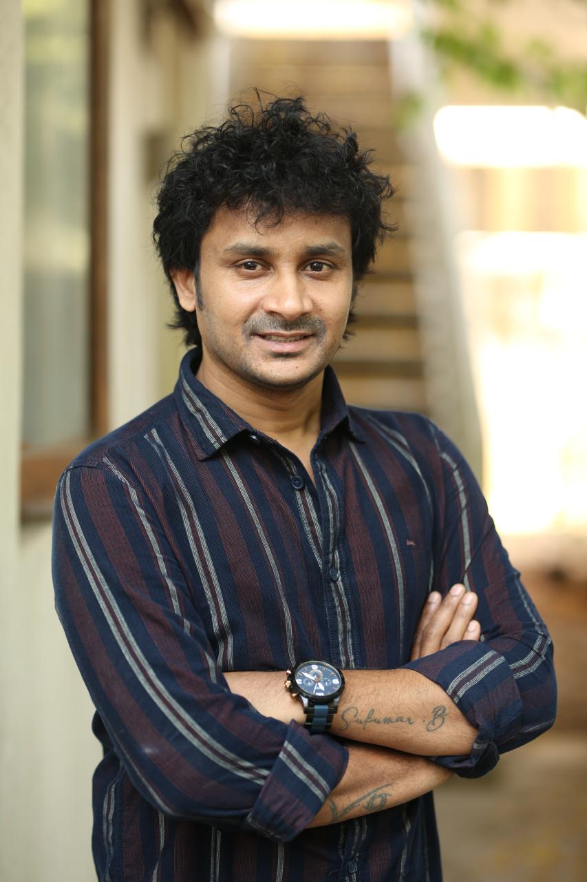 Suvixith Bojja stylish portrait in striped casual wear