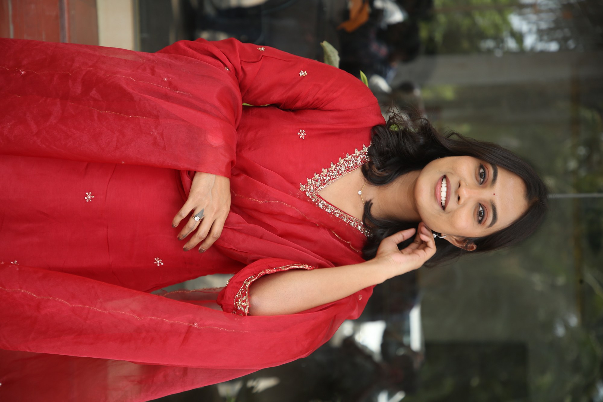 Vishika showcasing timeless charm in red attire