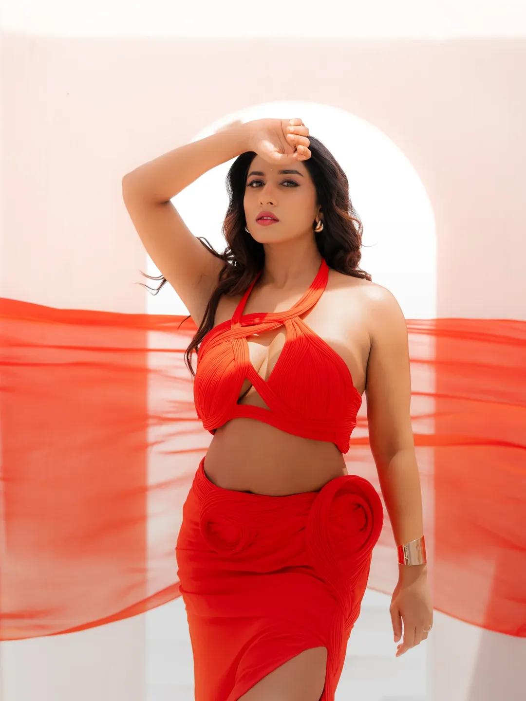 Vishnupriyaa Bhimeneni stylish red cutout gown