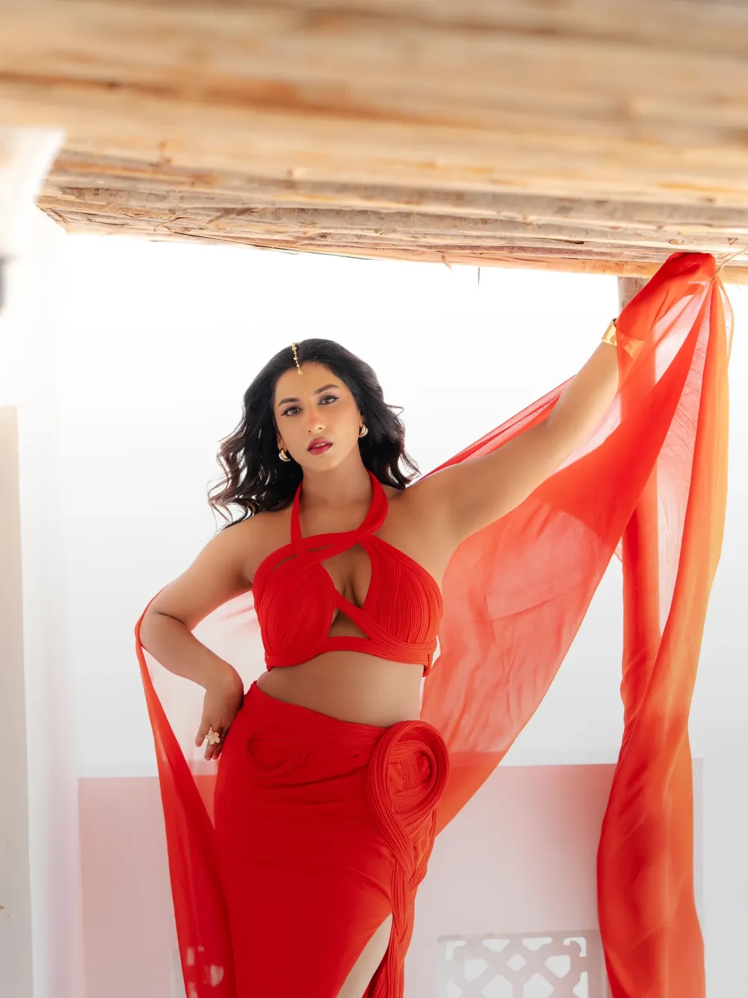 Vishnupriyaa Bhimeneni avant-garde red fashion portrait