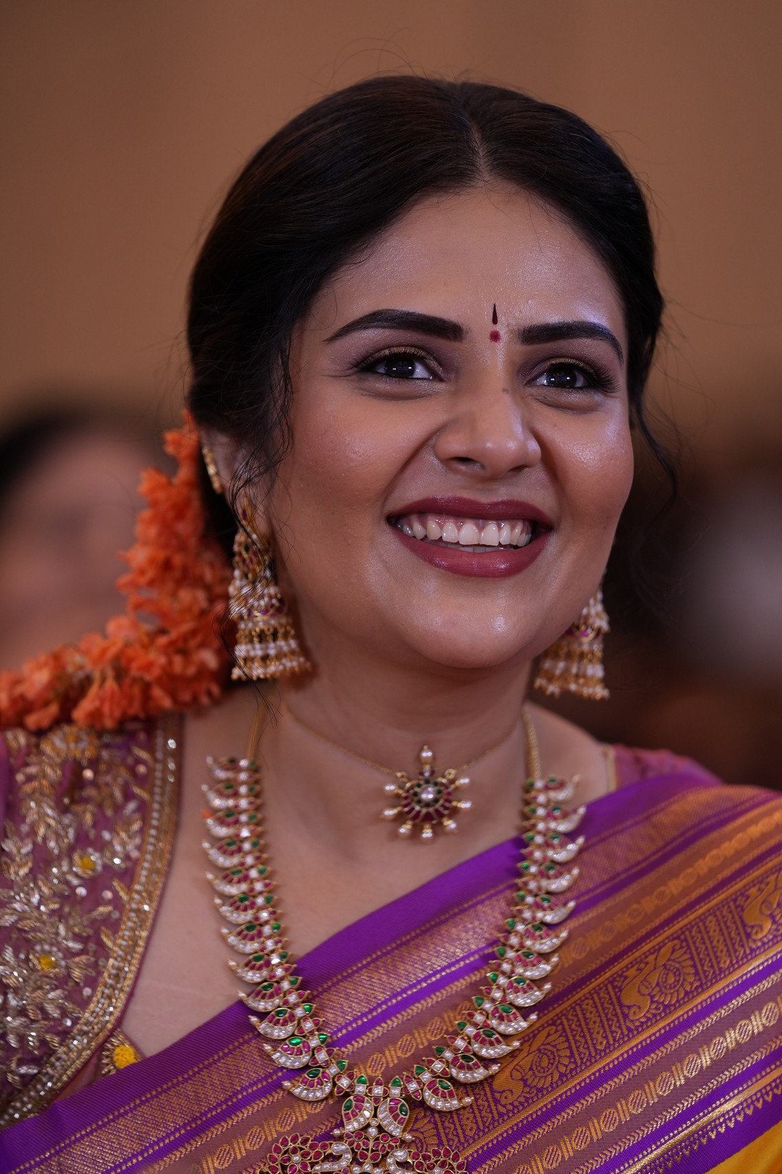 Sreemukhi purple yellow saree outfit