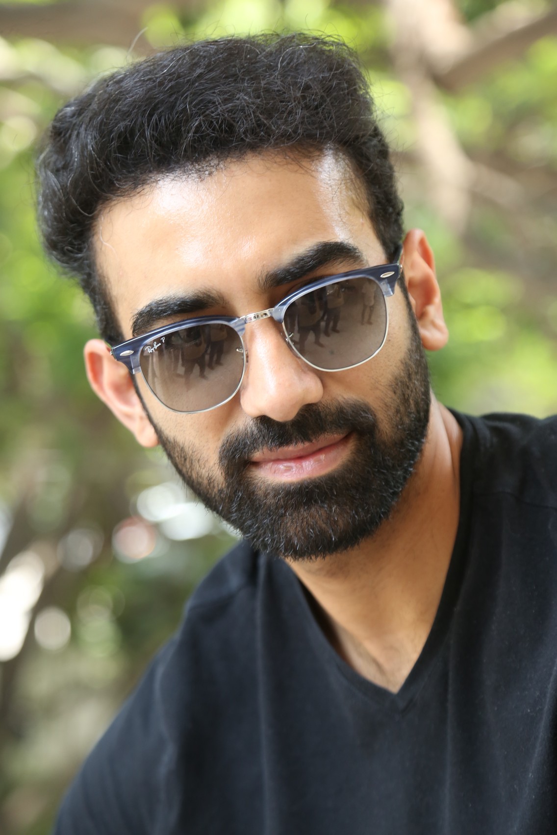 Akash Goparaju black tee stylish pose