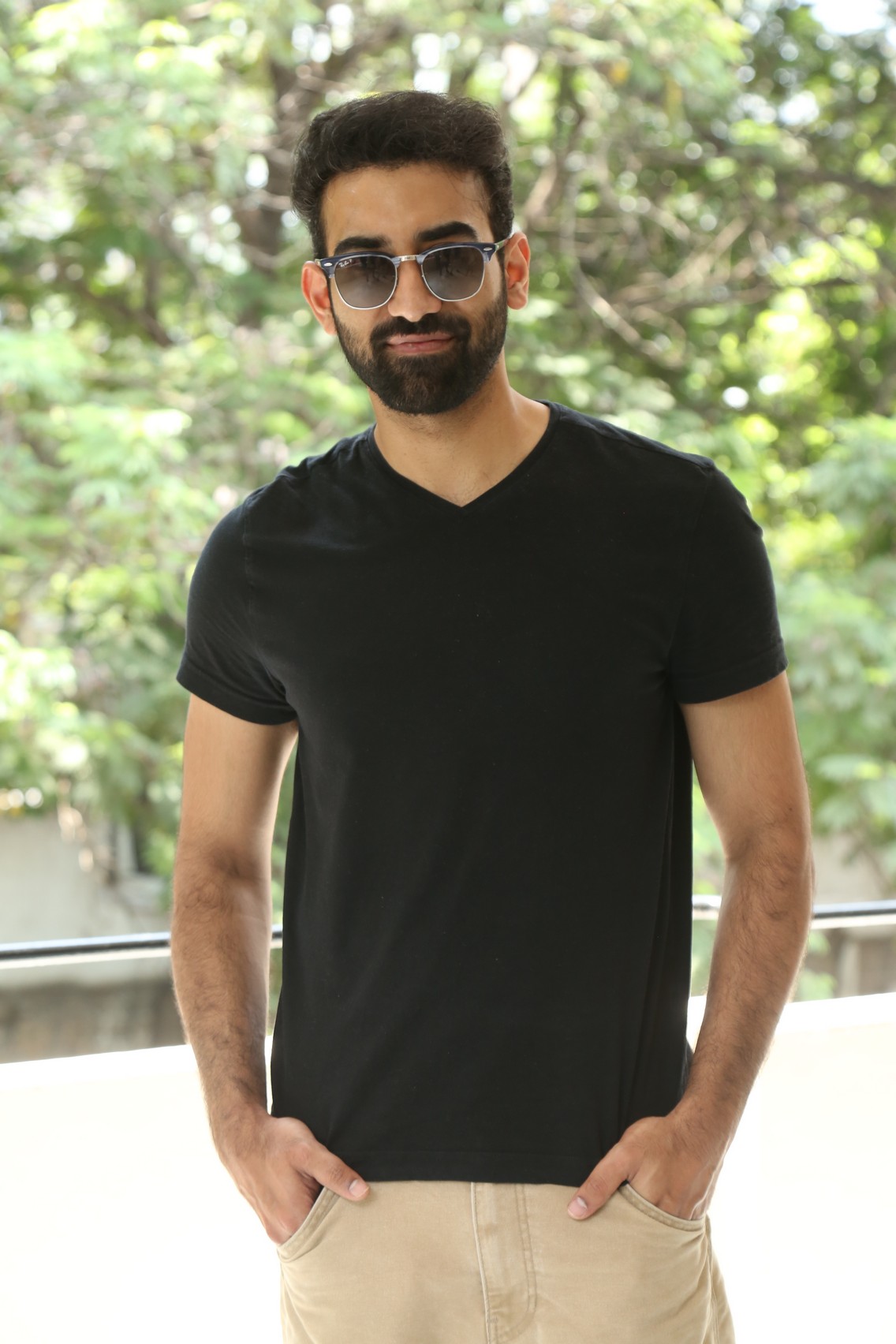 Akash Goparaju black tee beige chinos