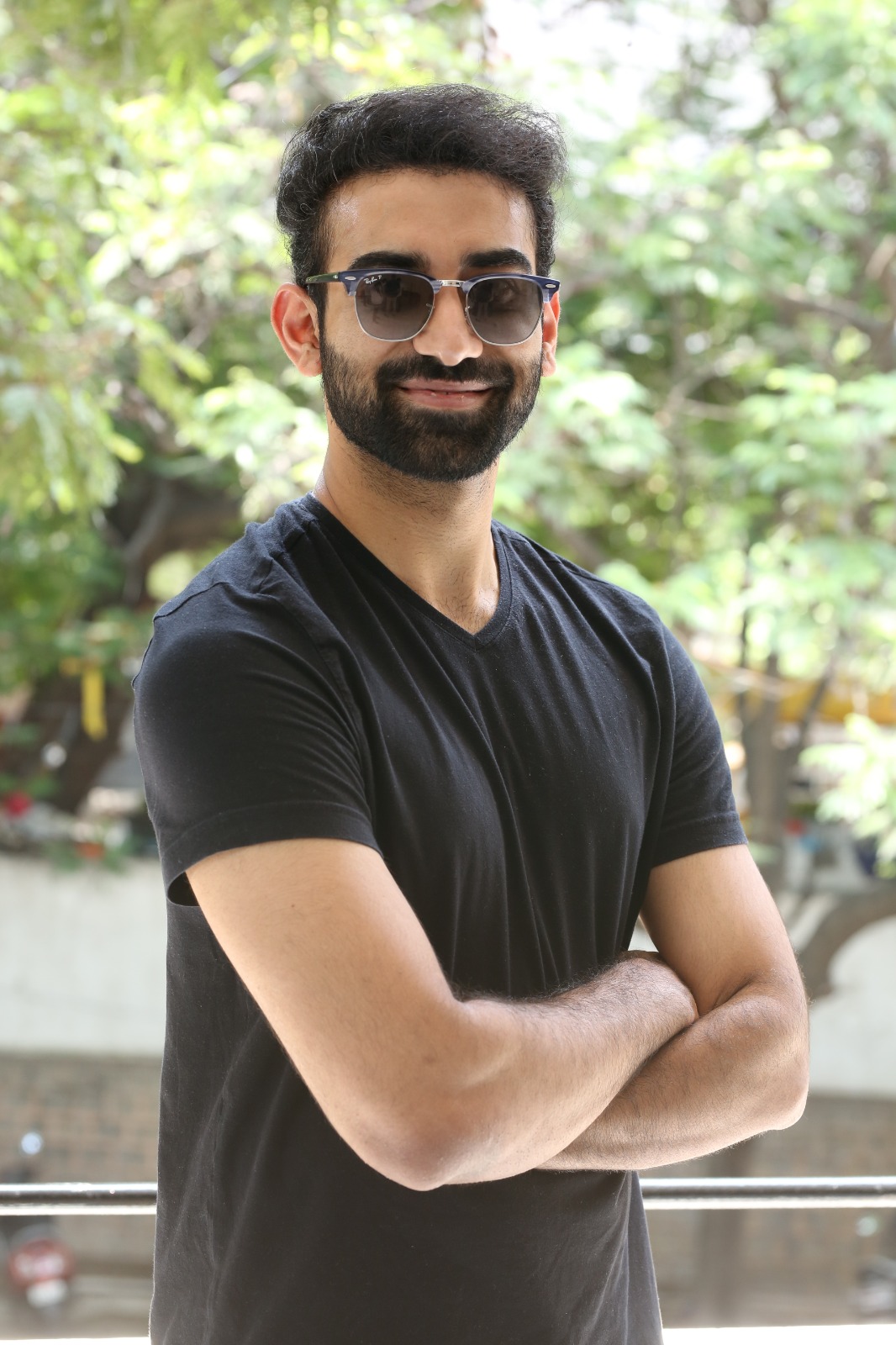 Akash Goparaju sleek black outfit