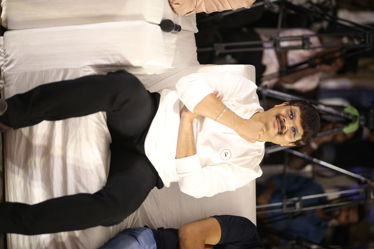 Boyapati Srinu seated at song launch