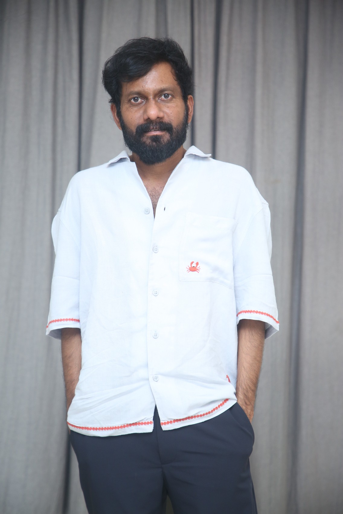 Buchi Babu Sana showcasing smart casual fashion style