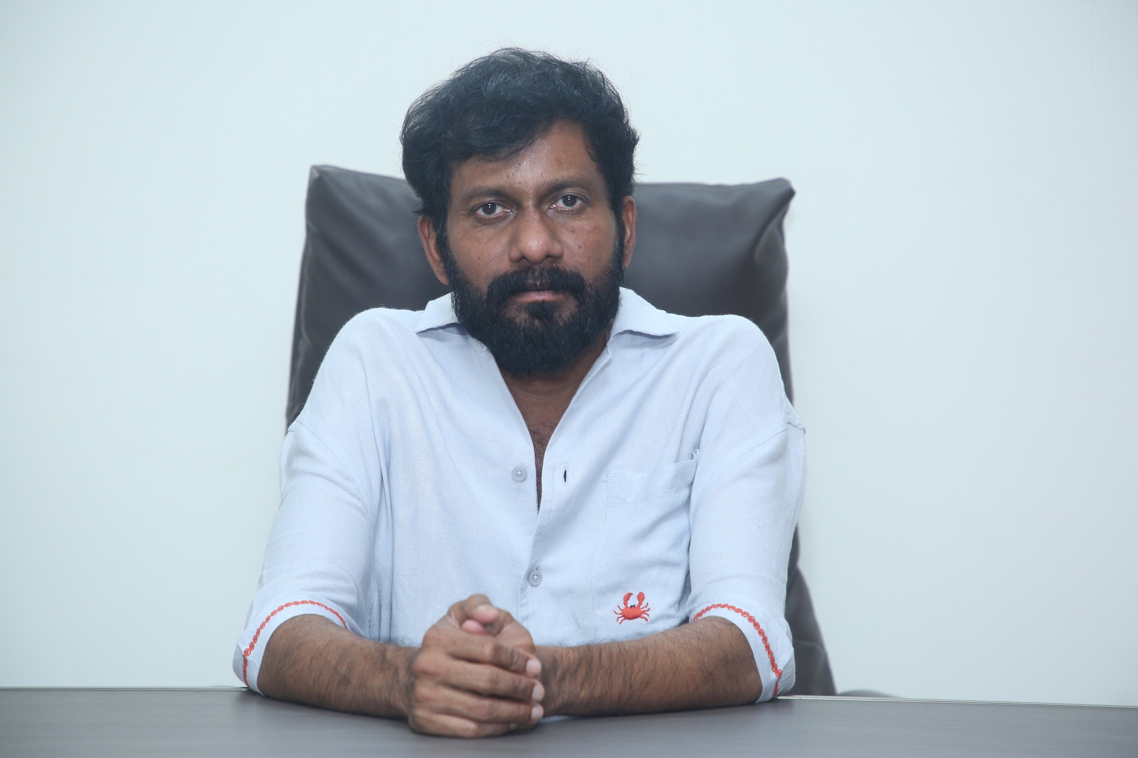 Buchi Babu Sana displaying sharp casual style