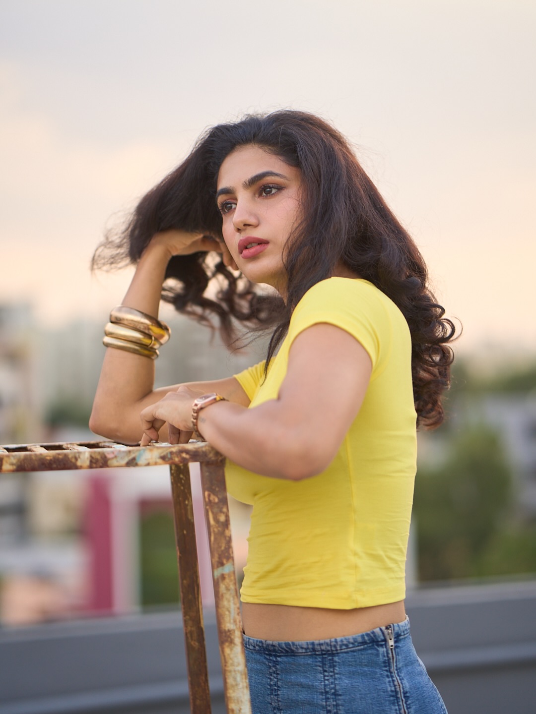 Deepa Thomas yellow rooftop style