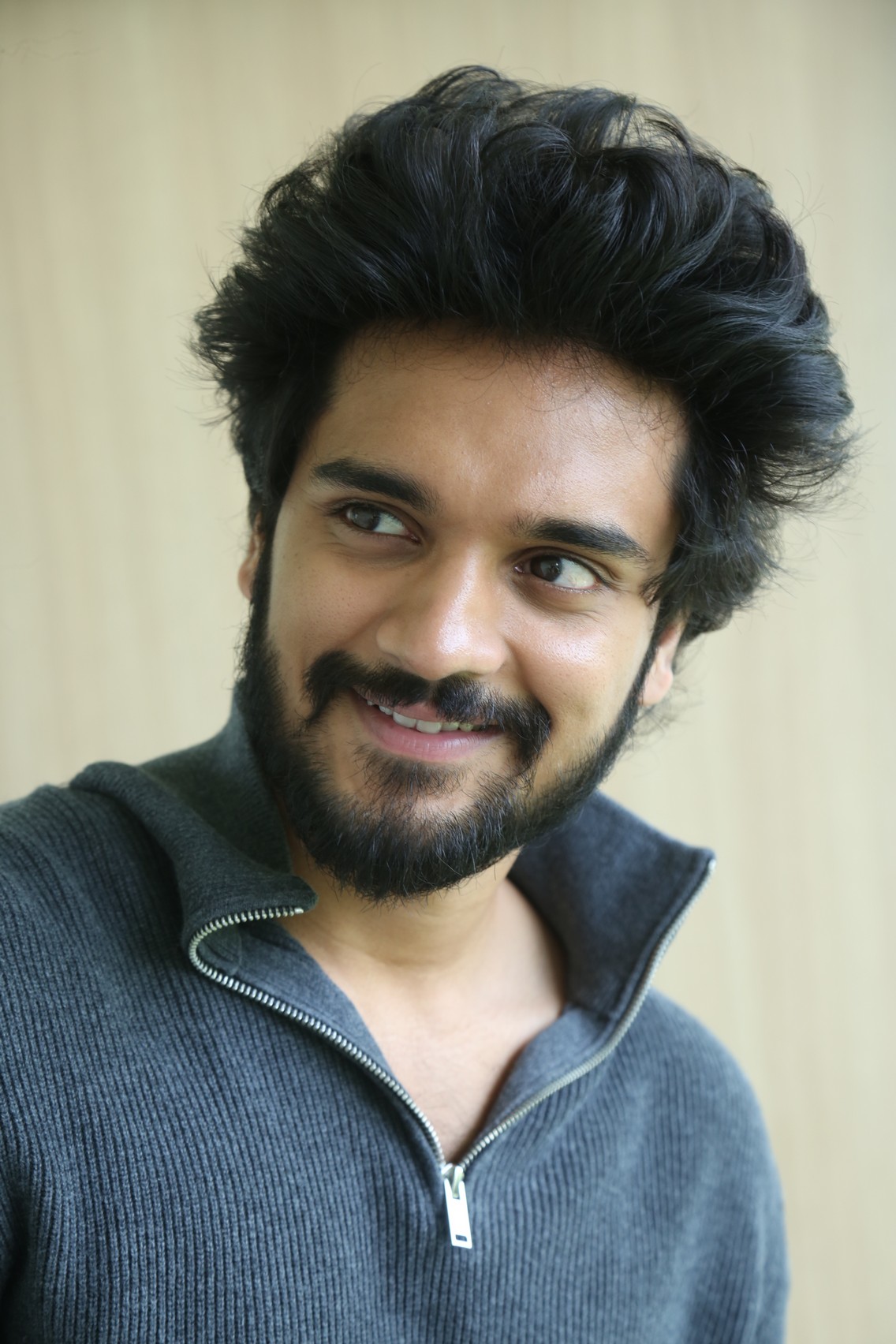Harshith Reddy fashionable hairstyle portrait