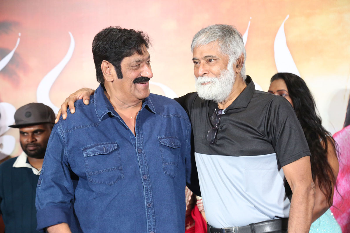 Raghubabu and Bhanu Chander posing together at the Kotha Malupu teaser launch.