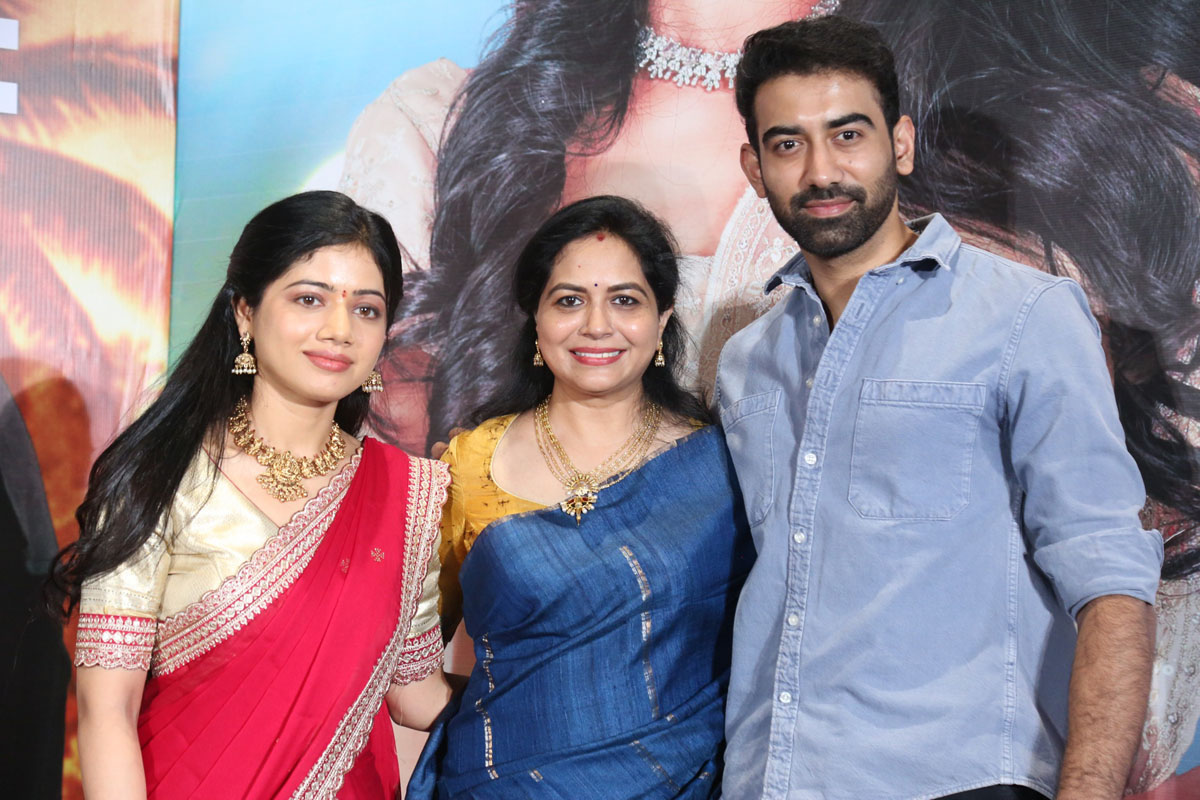 Bhairavi Ardhya, Sunitha, and Akash Goparaju posing together at the Kotha Malupu event.