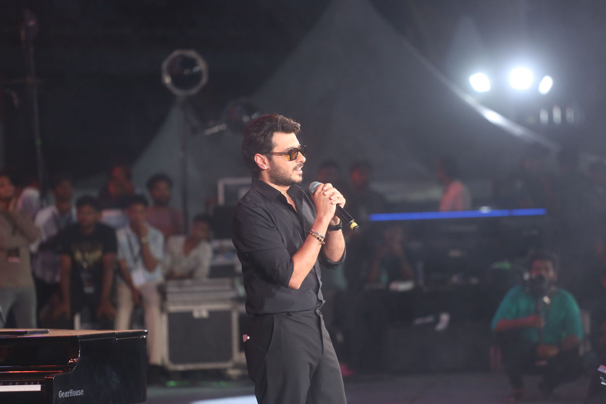 Divyendu Sharma speaking at Peddi movie promotional event.