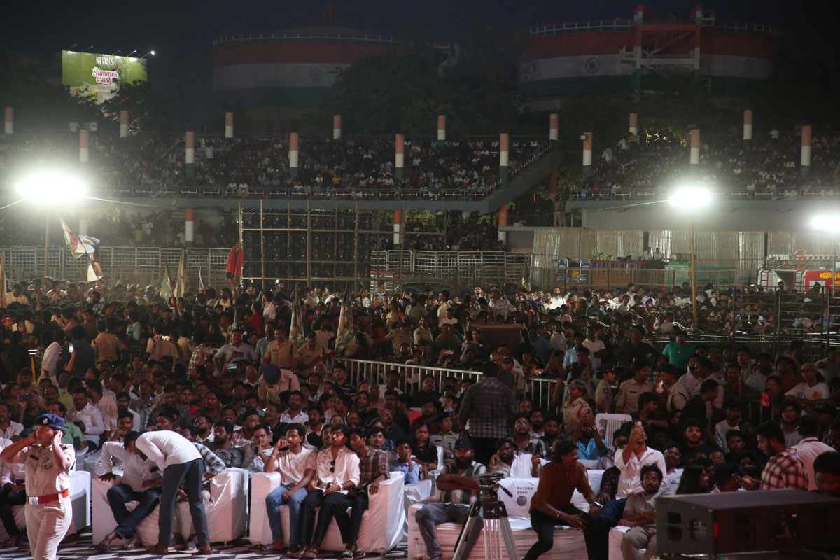 Huge crowd attending Peddi movie promotional event in Vijayawada.