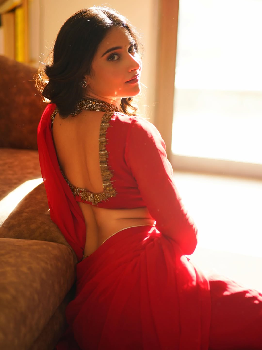 Prisha Rajesh Singh red saree portrait