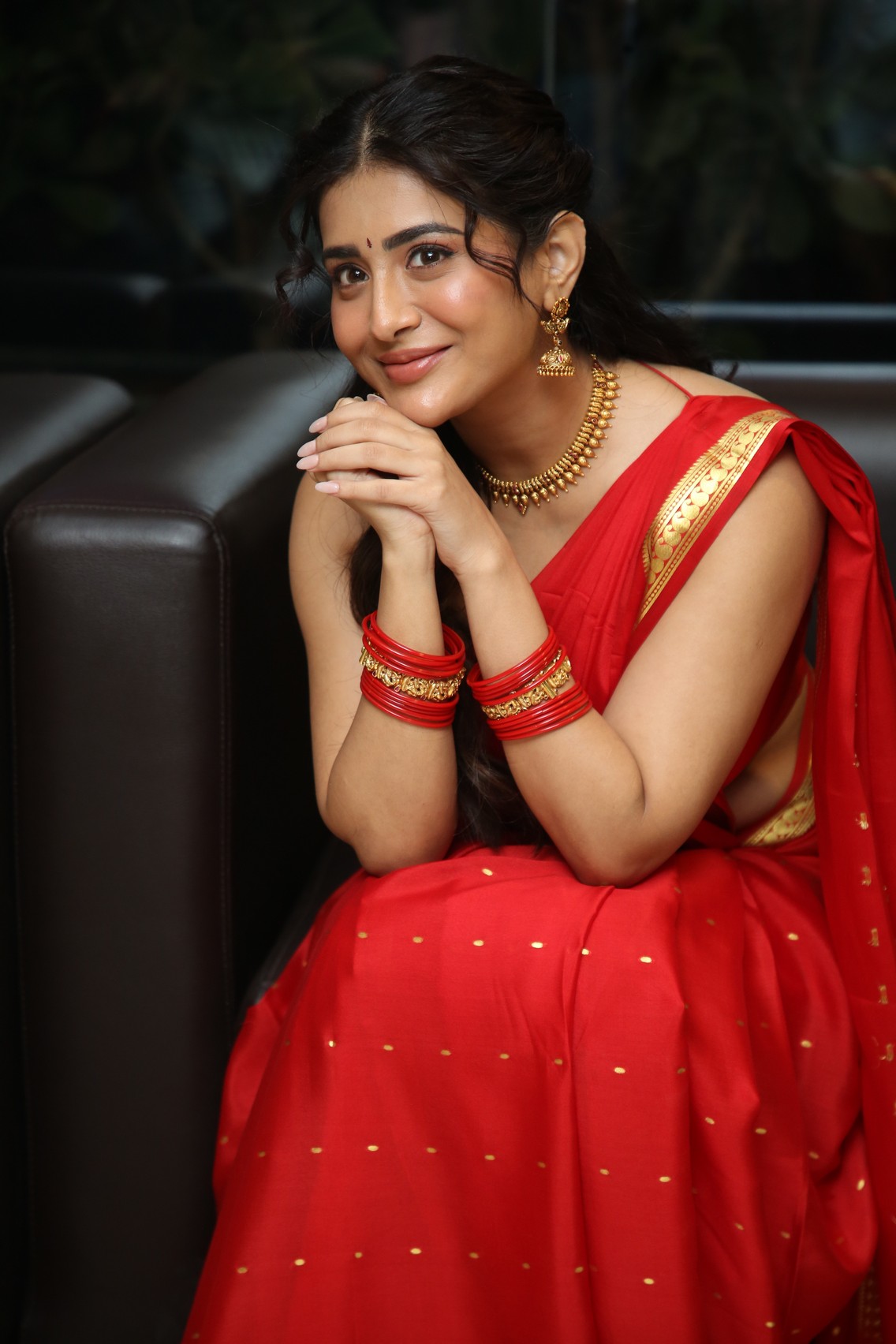 Rashi Singh showcasing traditional red saree style