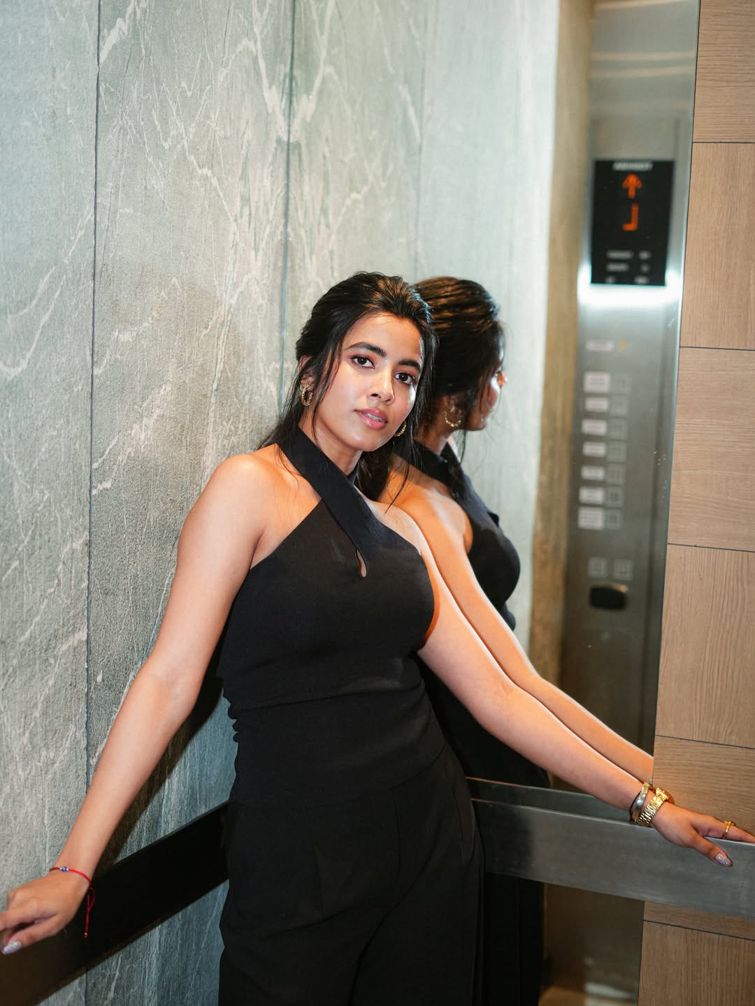 Shivani Nagaram in stylish elevator pose