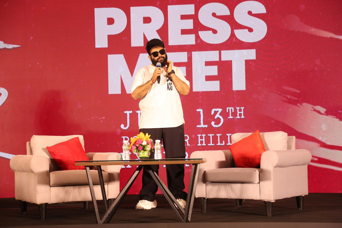 SS Thaman greeting media at event