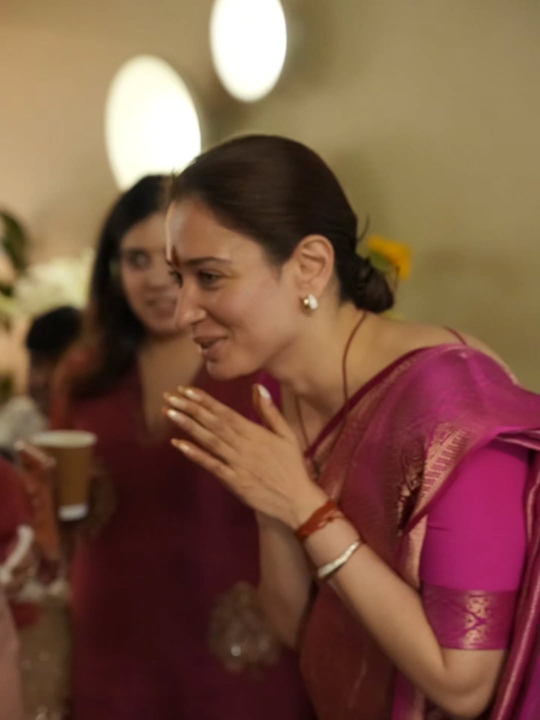 Tamannaah Bhatia praying at decorated altar