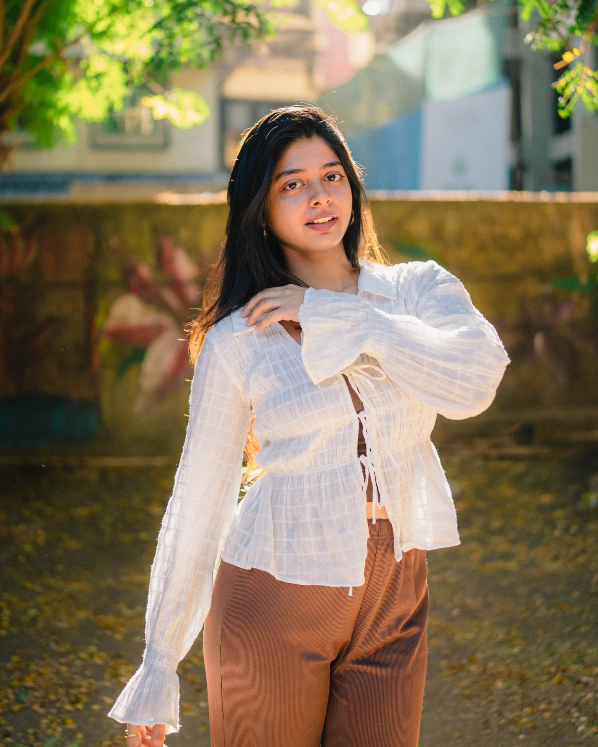 Yashashree Rao white top brown trousers