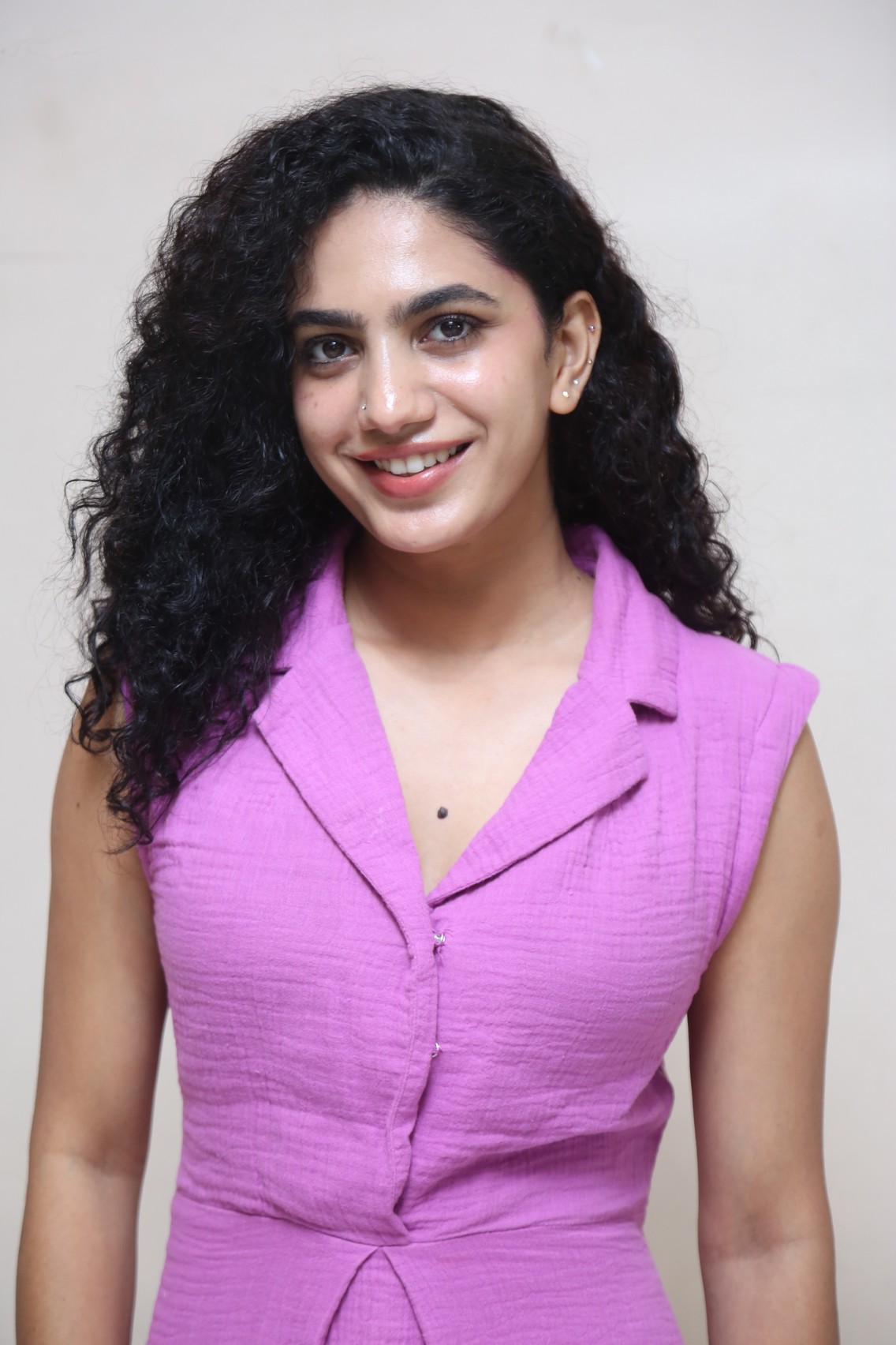 Deepa Thomas in elegant pink dress