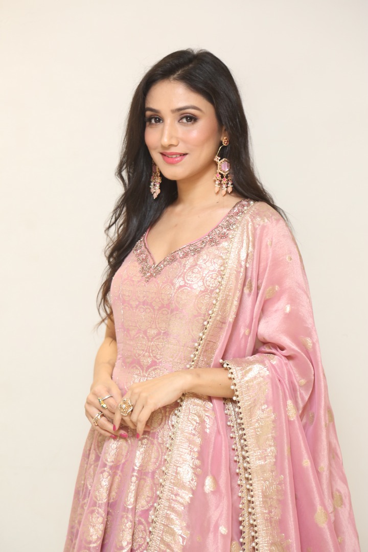 Donal Bisht wearing embroidered pink attire