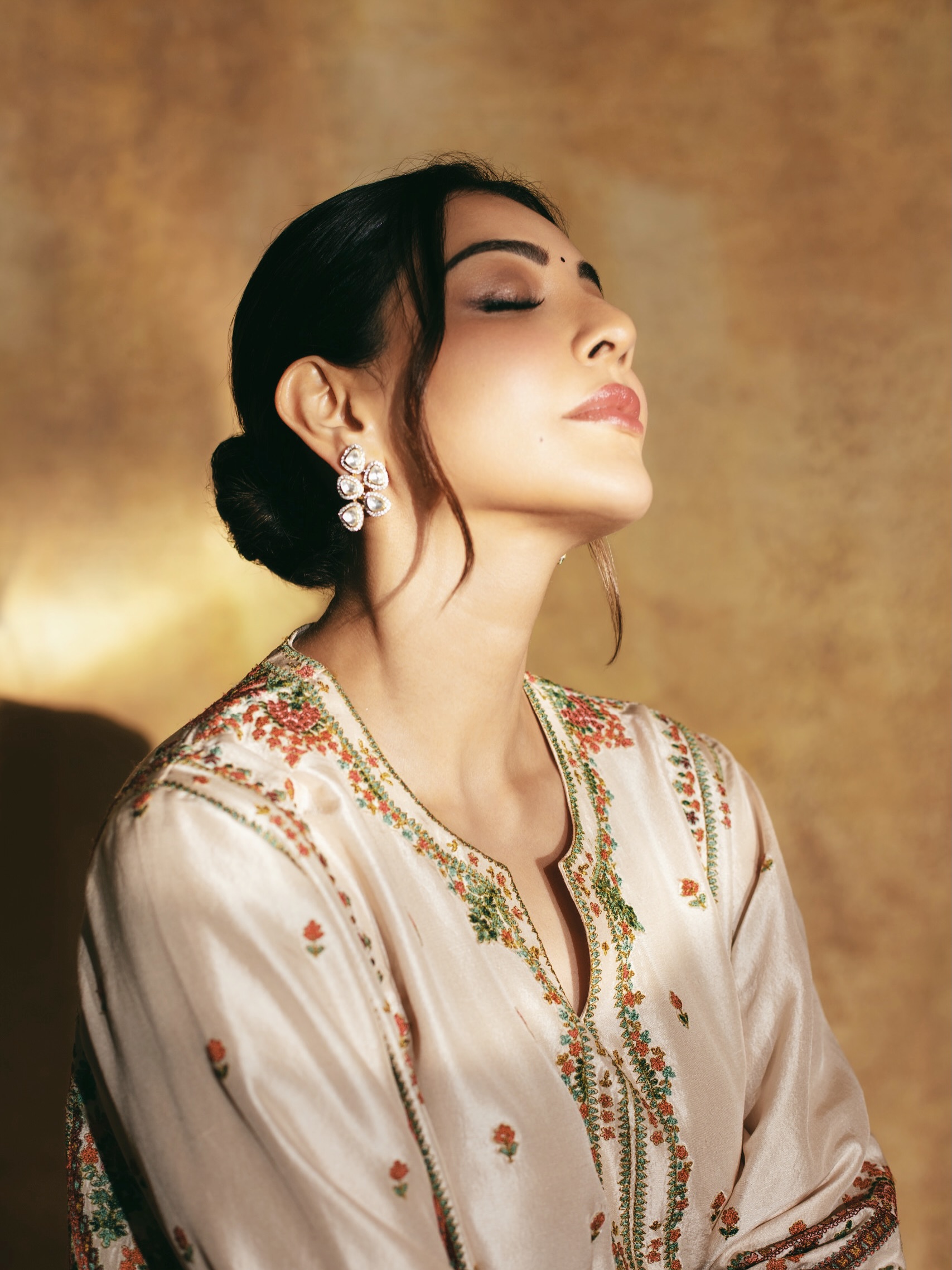 Kajal Aggarwal in embroidered cream outfit