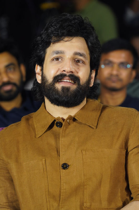 Akhil Akkineni seated at Lenin movie event.