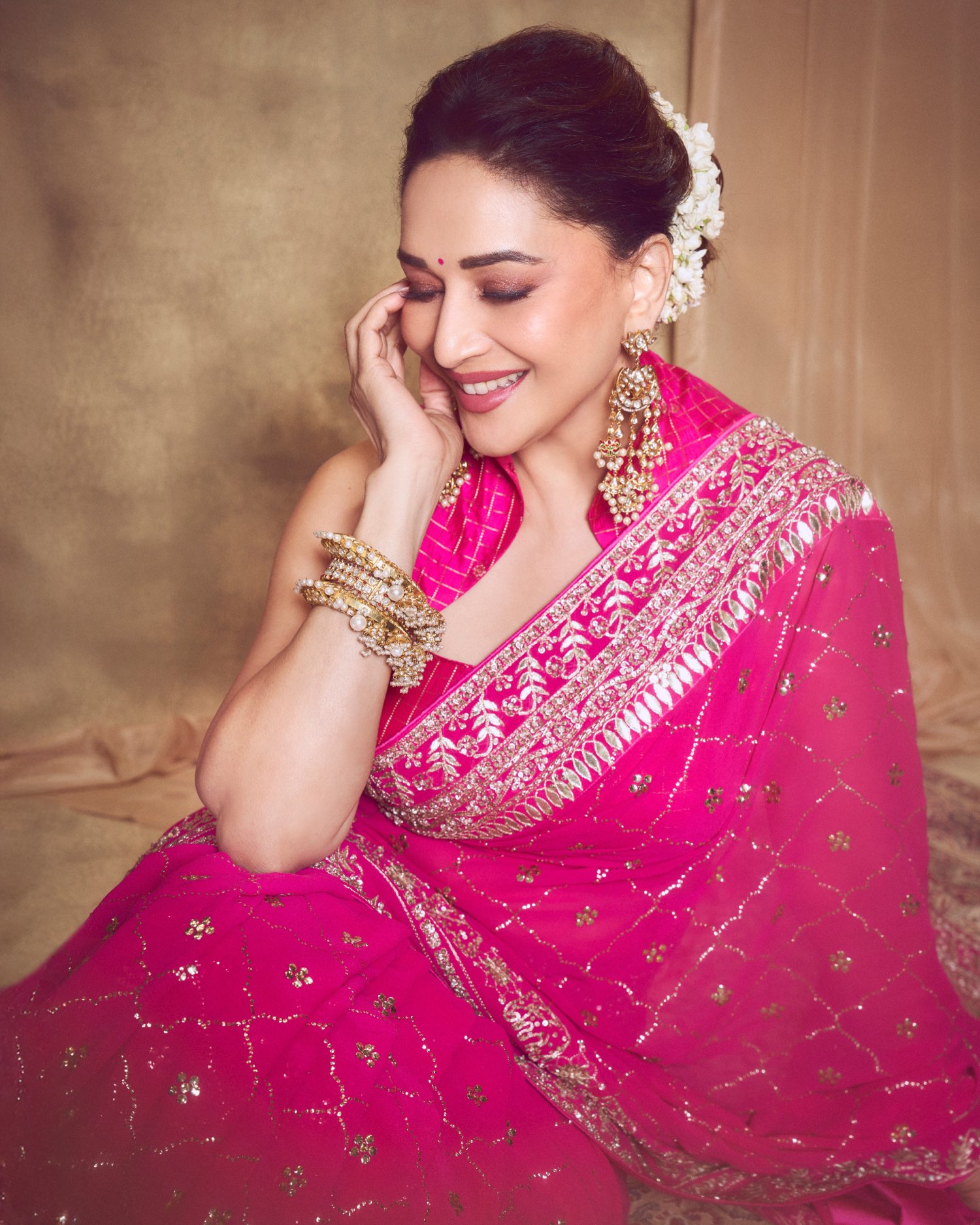 Madhuri Dixit smiling in saree