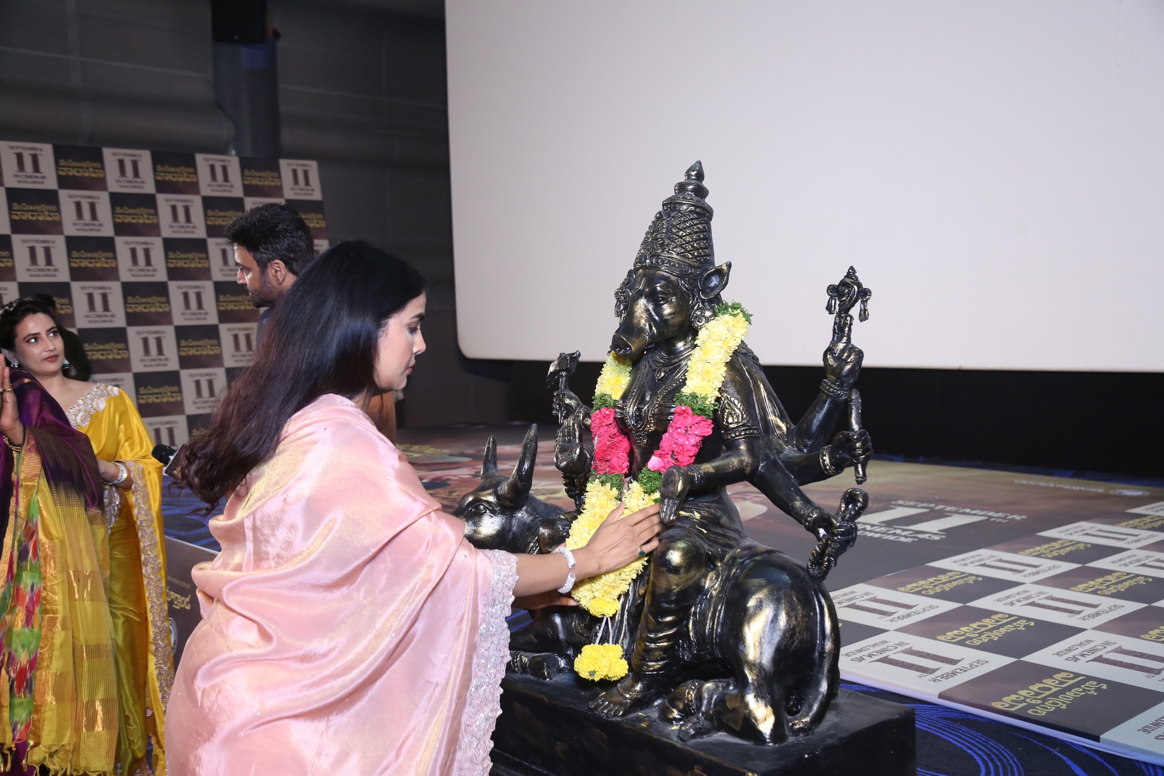 Meenakshi Goswami offering a garland during Mahendragiri Varahi event