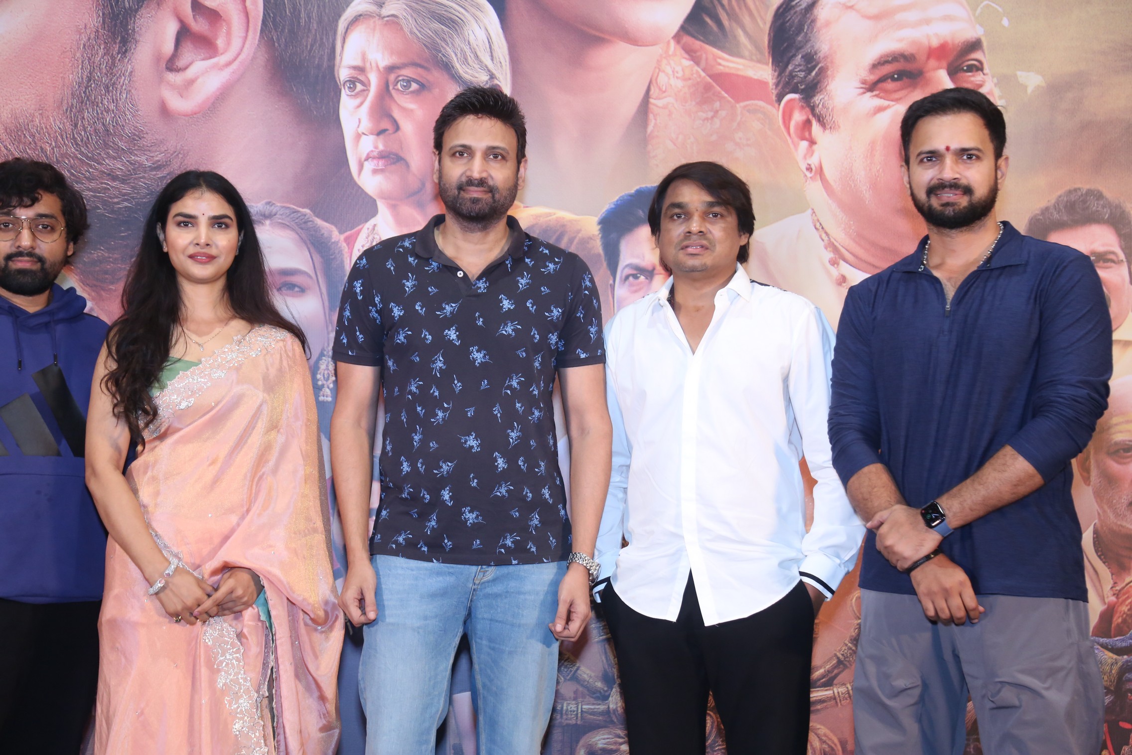 Actress Meenakshi Goswami, actor Sumanth, producer Madhu Kalipu, and actor Vamsi Chaganti pose together for the media.