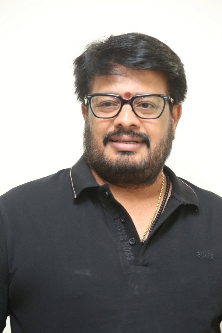 Maheswara Reddy Mooli confident pose