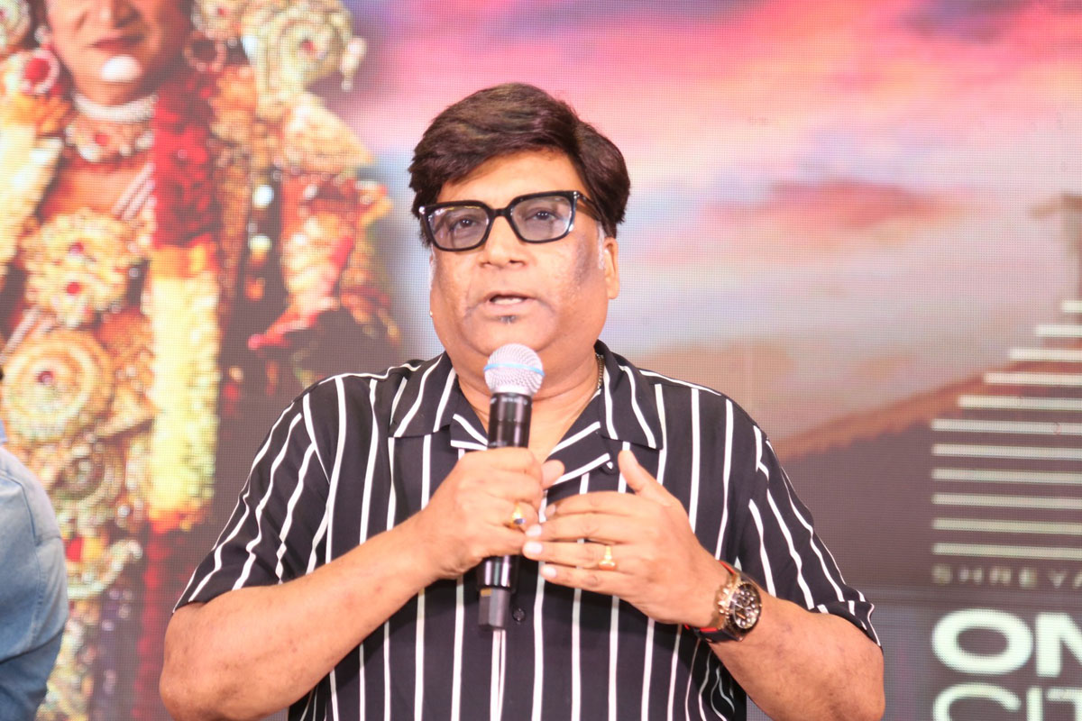 Kona Venkat speaking at pre-release event