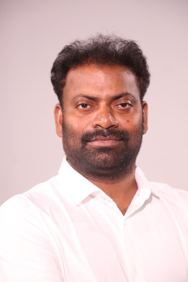 Mittapalli Surender smiling portrait