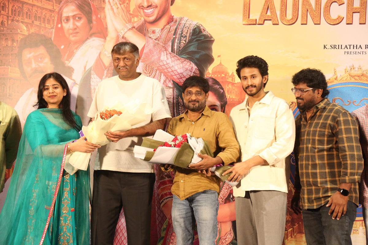 Ruthvik and Raja The Raja team posing at trailer launch event
