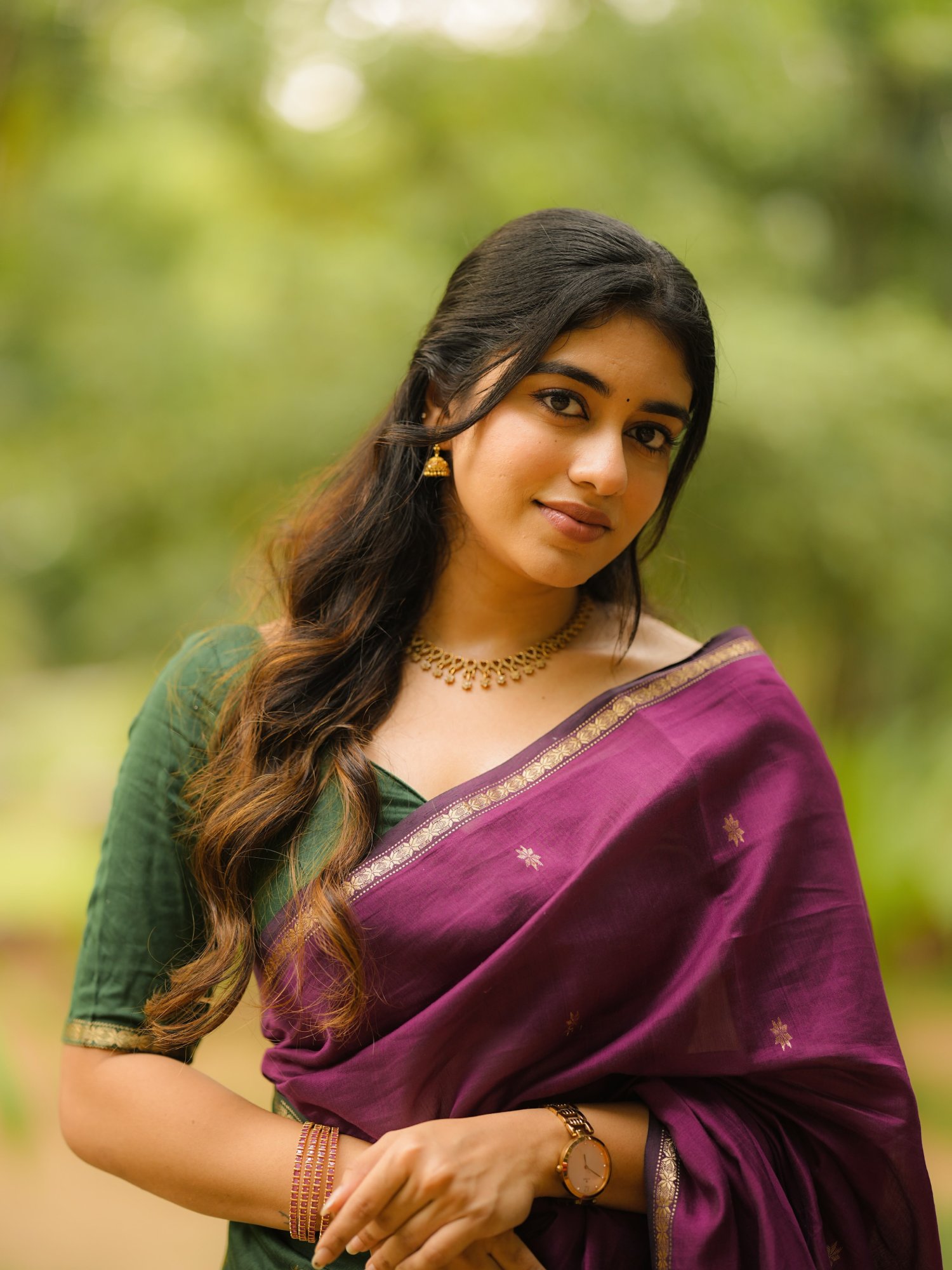 Ramya Ranganathan purple saree portrait
