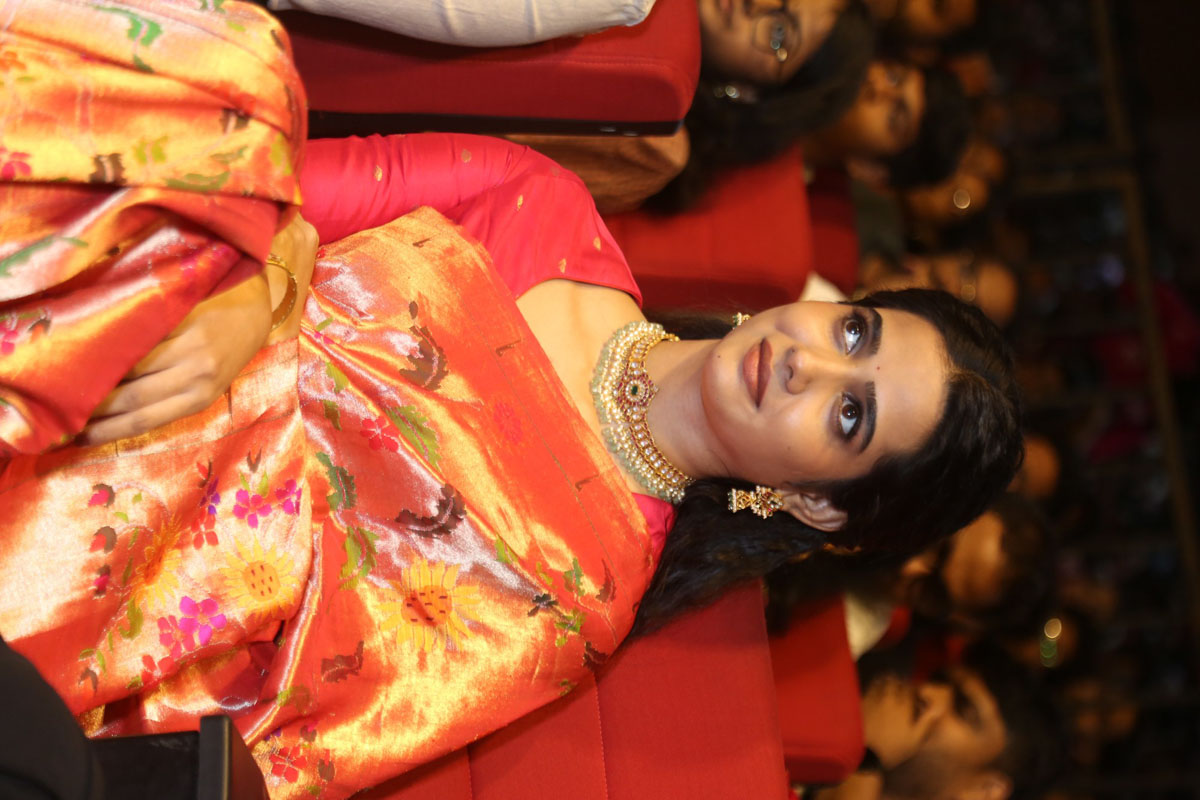 Sri Gouri Priya in coral silk saree