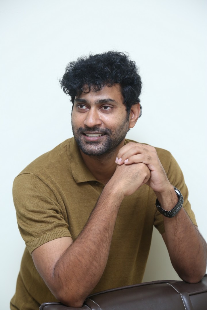 Thiruveer smiling stylish portrait